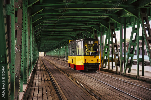 City tram on bridge at day in Warsaw, Poland