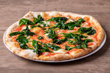 details of fresh tasty spinach pizza