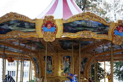 Children's carousel in an amusement park, an amusement park.
