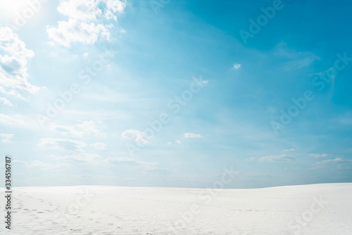Photography beautiful clean beach with white sand and blue sky with white clouds