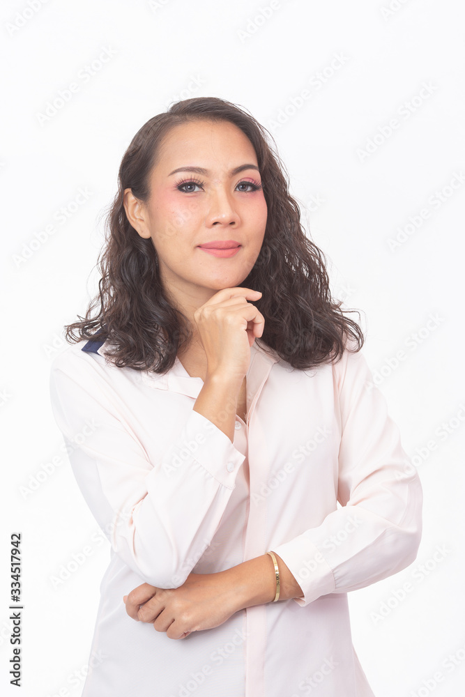 Curly hair woman with a pastel pink shirt Curly hair woman with a pastel pink shirt