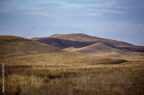 Landscape Steppe hills in autumn at sunset