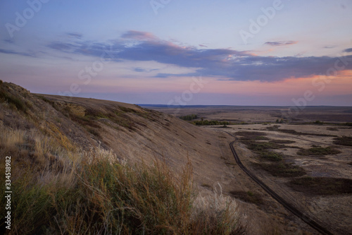 Landscape Steppe hills in autumn at sunset