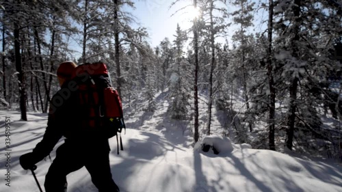Wilderness snowshoeing in a forest in Whiteshell Provincial Park in eastern Manitoba, Canada photo