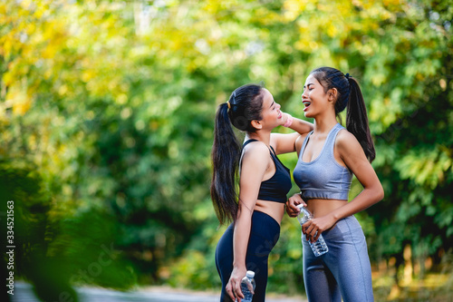 Fototapeta Naklejka Na Ścianę i Meble -  Women exercise happily for good health. Exercise concept