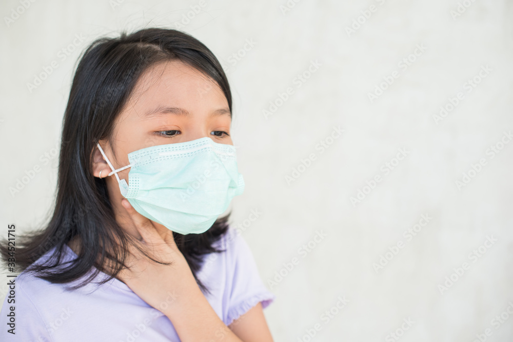 asia women wearing hygienic mask to prevent the virus PM2.5, Coronavirus, (2019-nCoV) asian little girl feeling unwell and coughing as symptom for cold or pneumonia,bronchitis. healthcare concept. asia women wearing hygienic mask to prevent the virus PM2.5, Coronavirus, (2019-nCoV) asian little girl feeling unwell and coughing as symptom for cold or pneumonia,bronchitis. healthcare concept.