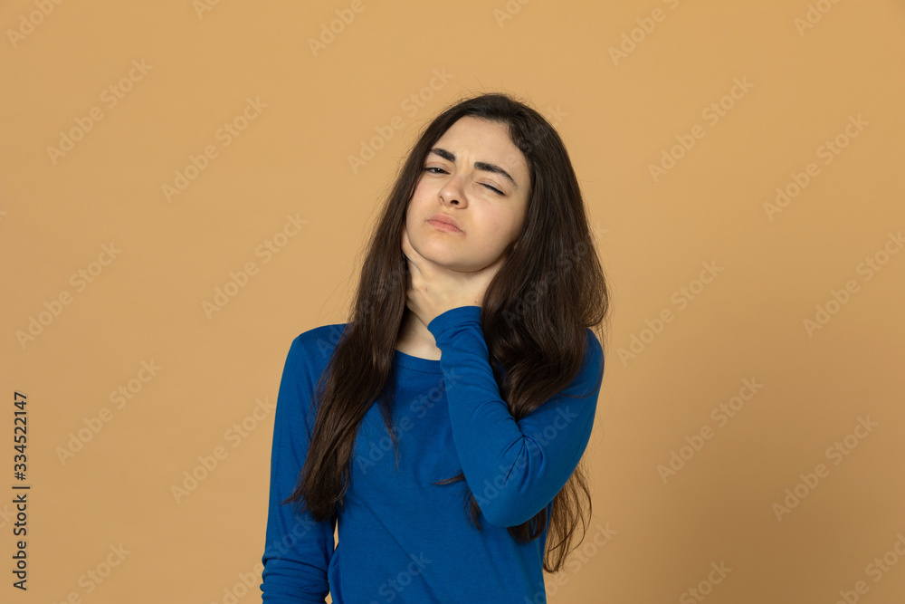 Brunette young girl wearing blue jersey Brunette young girl wearing blue jersey