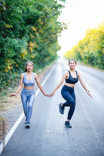 Women exercise happily for good health. Exercise concept © FOTO SALE
