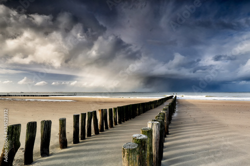 shower clouds over North sea beach