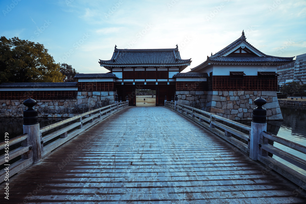 Hiroshima, Japan - January 09, 2020: Inner Buildings in the Black Carp Castle yard Hiroshima, Japan - January 09, 2020: Inner Buildings in the Black Carp Castle yard