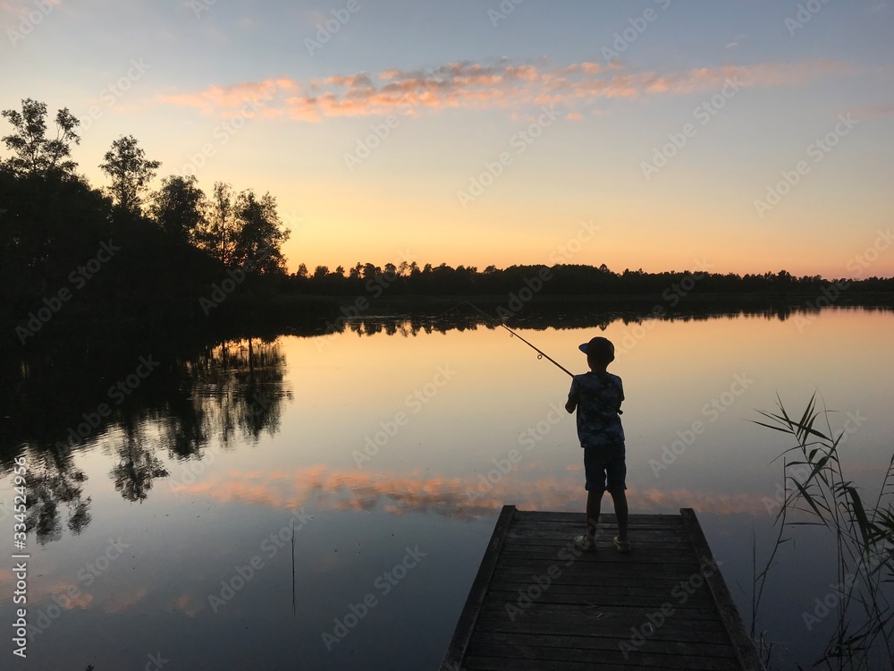 fishing at sunset