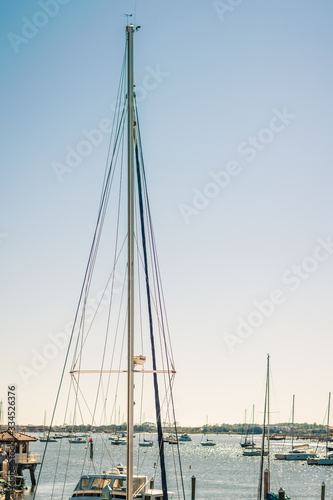 Sailboat without Sail Outlined Against the Sky