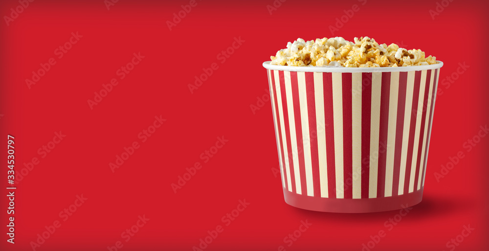 Paper striped bucket with popcorn
