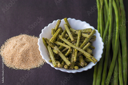 drumstick recipe with poppy seeds in Bengali style.Indian/Bangladeshi food.  photo