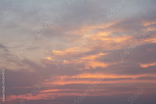 summer holiday pink orange sunset sky overlay with clouds  © Lumistudio