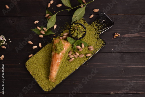 Turkish baklava with carrot slice pistachio photo