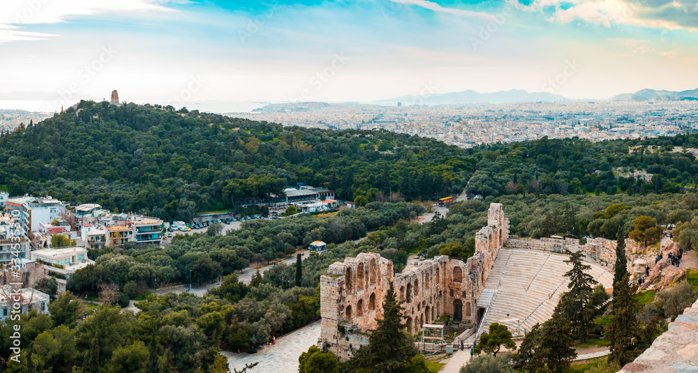 Panoramic view of the Odeon of Herodes Atticus and Athens city
