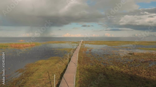 Footbridge in sea before storm