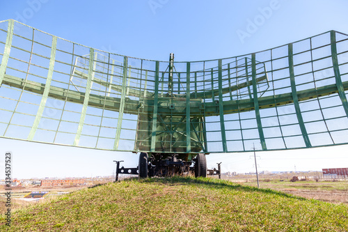 Old soviet military radar station against the blue sky