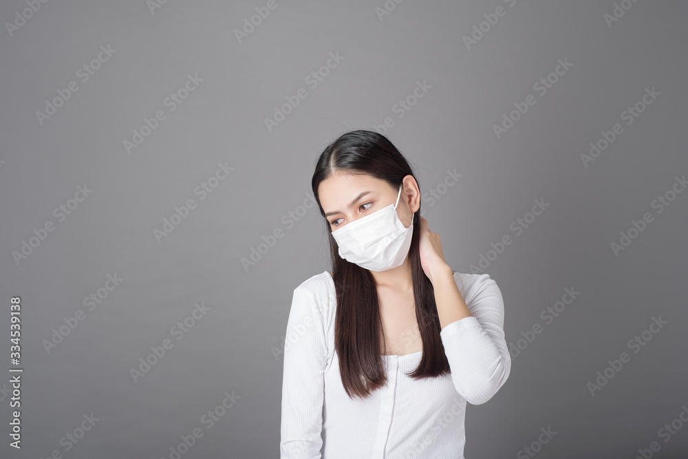 Portrait of woman with surgical mask in studio, Health care concept Portrait of woman with surgical mask in studio, Health care concept