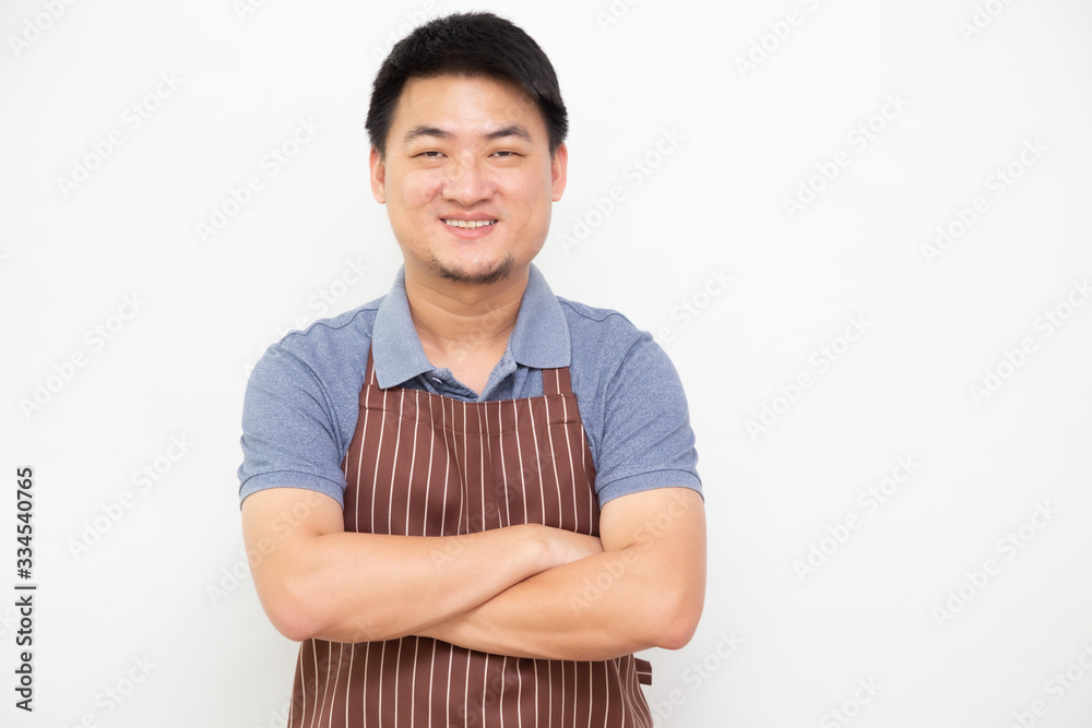 Portrait of Asian workers fresh market with brown apron standing with arms crossed isolated on white background Portrait of Asian workers fresh market with brown apron standing with arms crossed isolated on white background