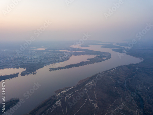 Landscape: blue hour over the Dnieper River in Kiev. Aerial drone view. © Sergey