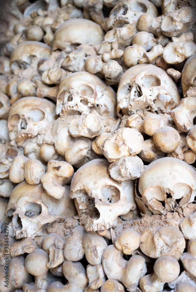 Pile of human sculls and bones in Bone Chapel (Capela dos Ossos) in Portugal, Algarve, Alcantarilha.