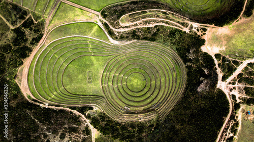Aerial view of Moray Archeological site - Inca ruins of several terraced circular depressions, in Maras, Cusco province, Peru. Top tourist attraction in Sacred valley of the Incas.  photo