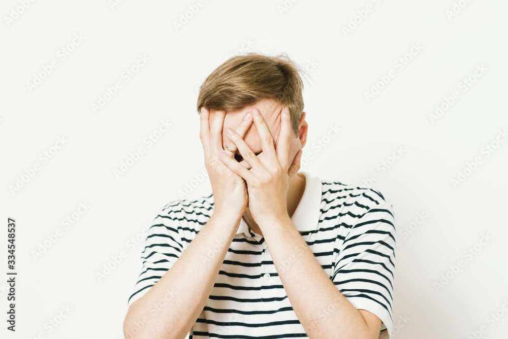 Man closes eyes with her hands Man closes eyes with her hands