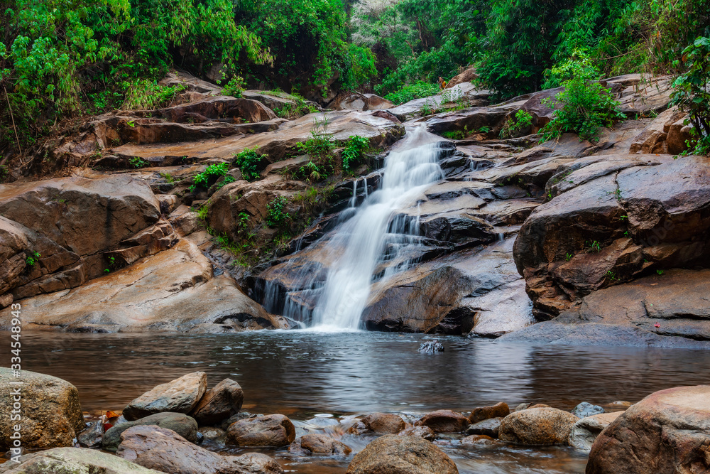 Water fall in forest with green tree nature Water fall in forest with green tree nature