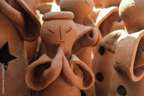 clay angel for sale at the Aracaju handicraft market photo