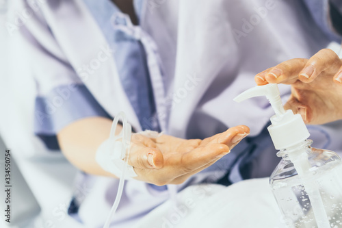 Blur background of hand clean washing launded with alcohol gel sanitizer pump in hospital to kill coronavirus germ flu. Hygiene protection coma serious weak patient such as elder, kids from illness photo