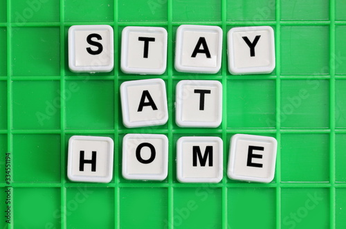 STAY AT HOME text during quarantine made with the letters of a w photo