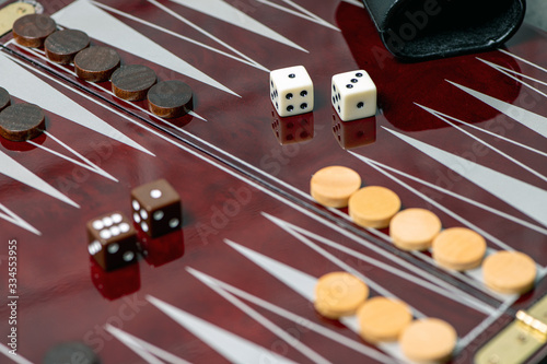 dice on a brown board for a game