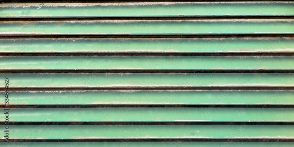 green background old metal gate striated planks texture green background old metal gate striated planks texture