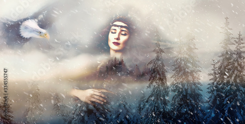 Shaman woman and eagle in winter landscape, artist collage.