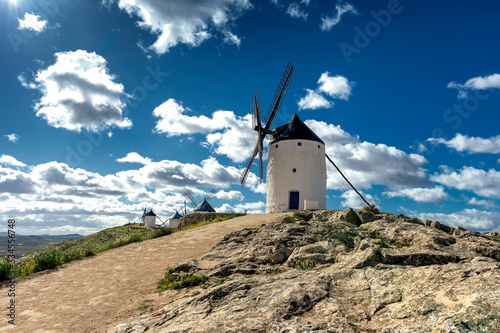 A group of ancient and historical windmills located on a hill in the town of Consuegra (Spain), on the route of the Cervantes mills (Don Quixote).