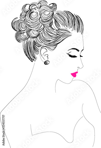 Woman with top knot and pink lips