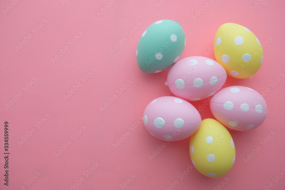 top view of easter eggs on color background 
