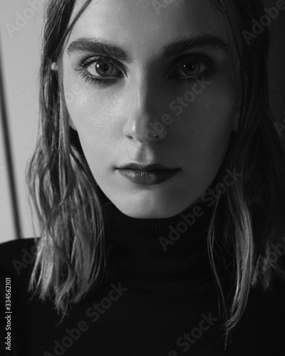 Black and white portrait of a girl in the studio