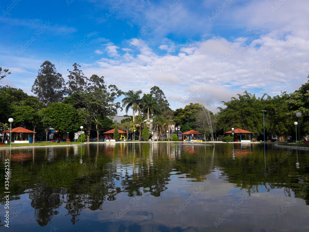 Taubaté, São Paulo, Brazil - January 5, 2018: water reflection in the lake of Monteiro Lobato park
