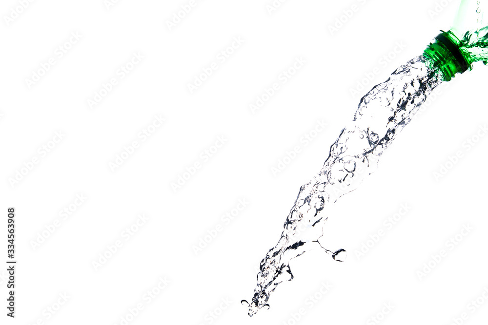 Water splashes from a clear green bottle Water splashes from a clear green bottle