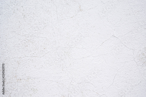 Texture of old cracked paint on the wall. White background for text or design