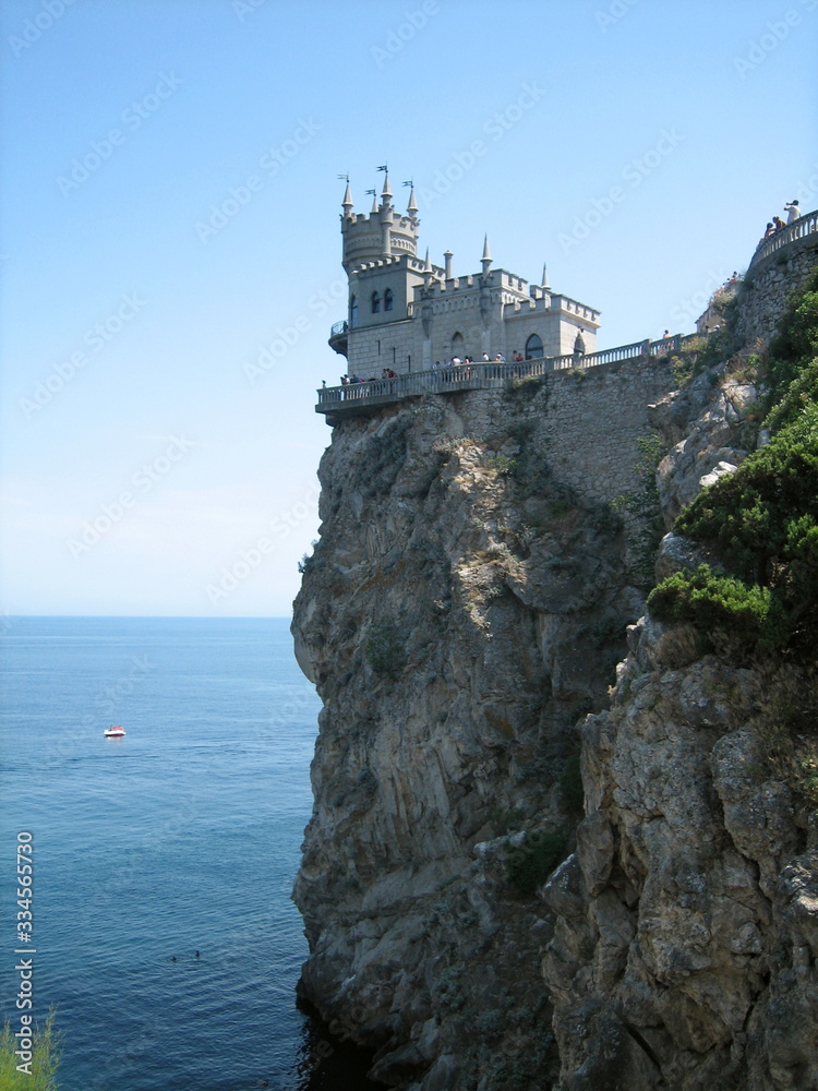 World-famous architectural monument swallow's nest on a high cliff above the sea in perfect weather.
