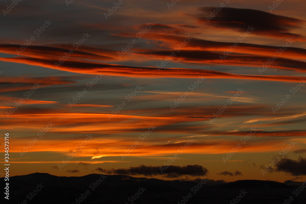 Beautiful sunset with orange clouds Beautiful sunset with orange clouds