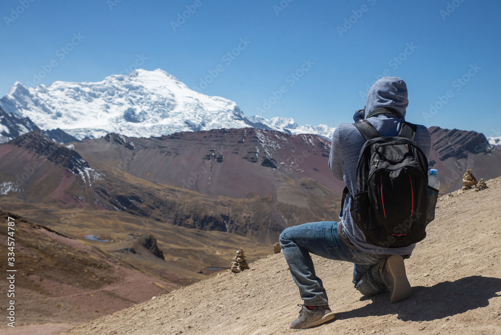 A photographer capturing the beautiful landscape