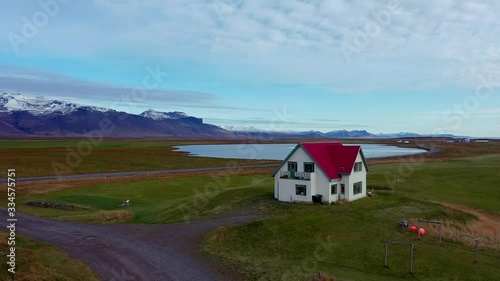 Aerial/ Drone footage of a little house somewhere in Iceland 