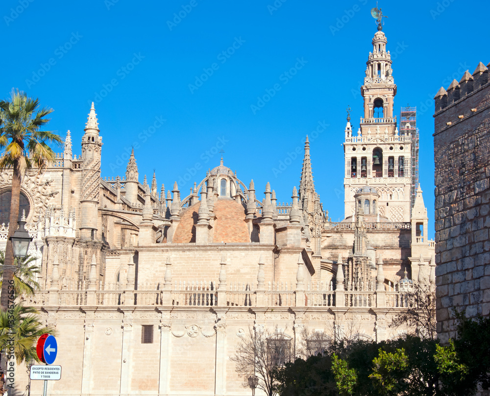 Side view to the cathedral of Seville, Spain.Clear blue sky, sunny winter day