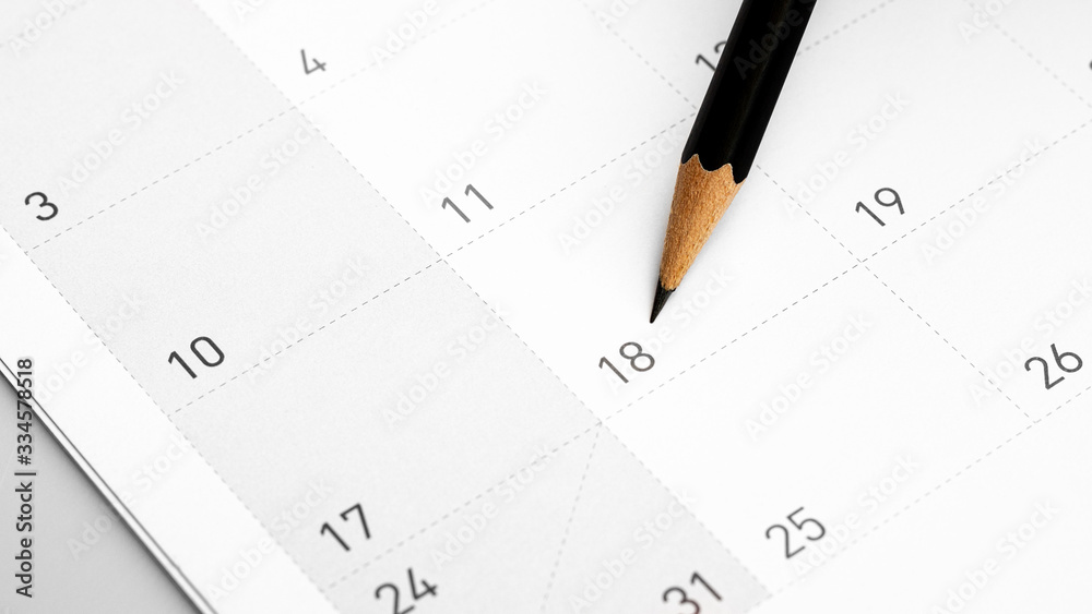 The pencil points to the 18 in the calendar. The pencil points to the 18 in the calendar.