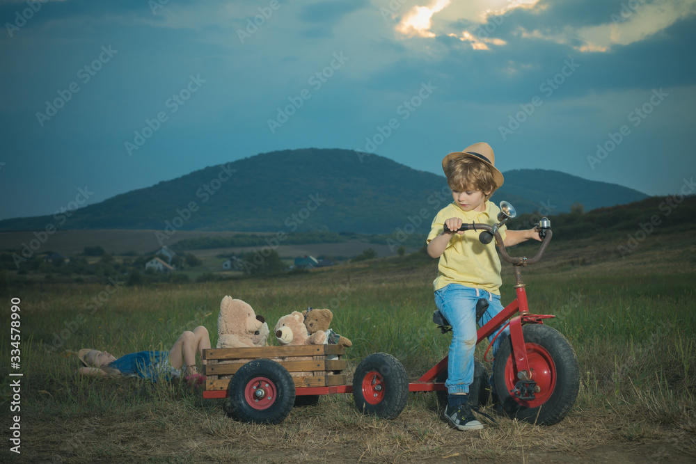 Naklejka premium Emotional child. Little boy and girl enjoy life and nature. International childrens day. Little kid outdoor. Happy moments. Happy little children smiling.